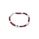 Elegant silver bracelet adorned with red beads and an evil eye motif.