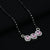 Elegant mangalsutra featuring pink sapphire and sparkling American diamonds.