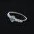 Elegant silver kada with green four-leaf clover.