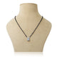 Charming silver mangalsutra featuring white gemstone and black beads.