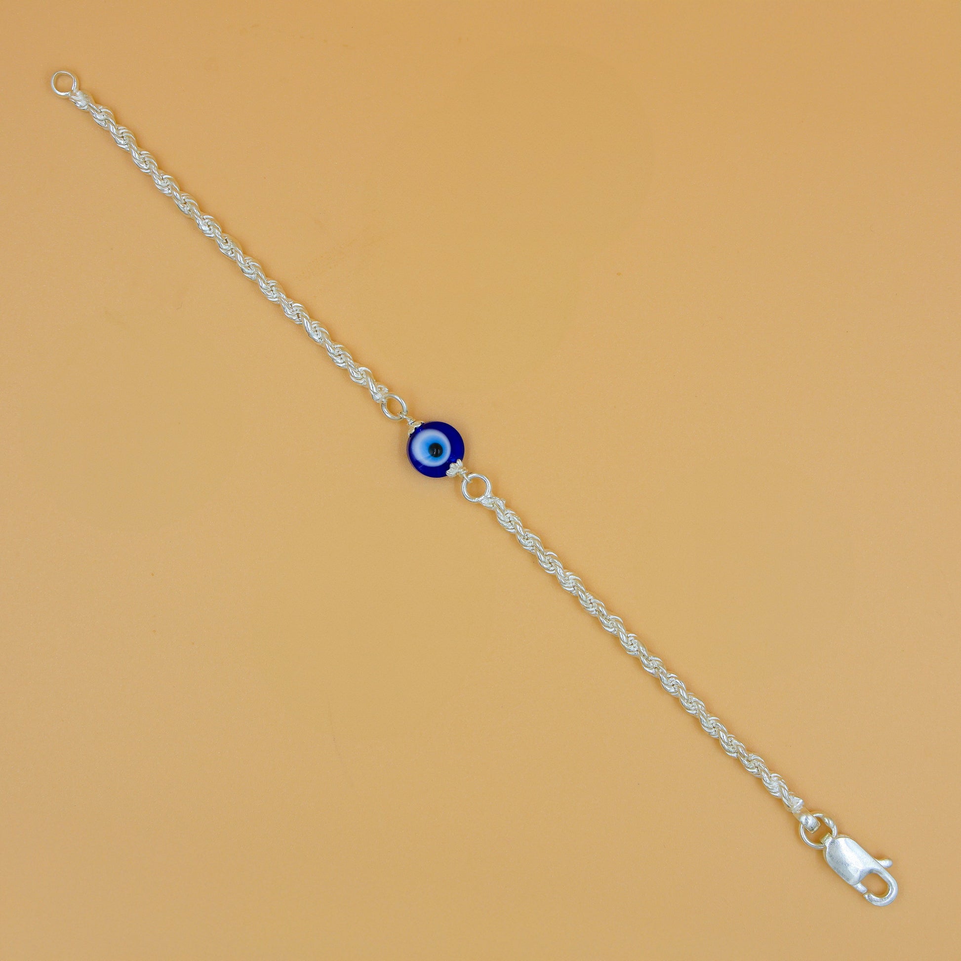 Stylish evil eye bracelet with a slim silver chain design