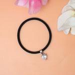 Load image into Gallery viewer, A Bracelet adorned with a heart charm
