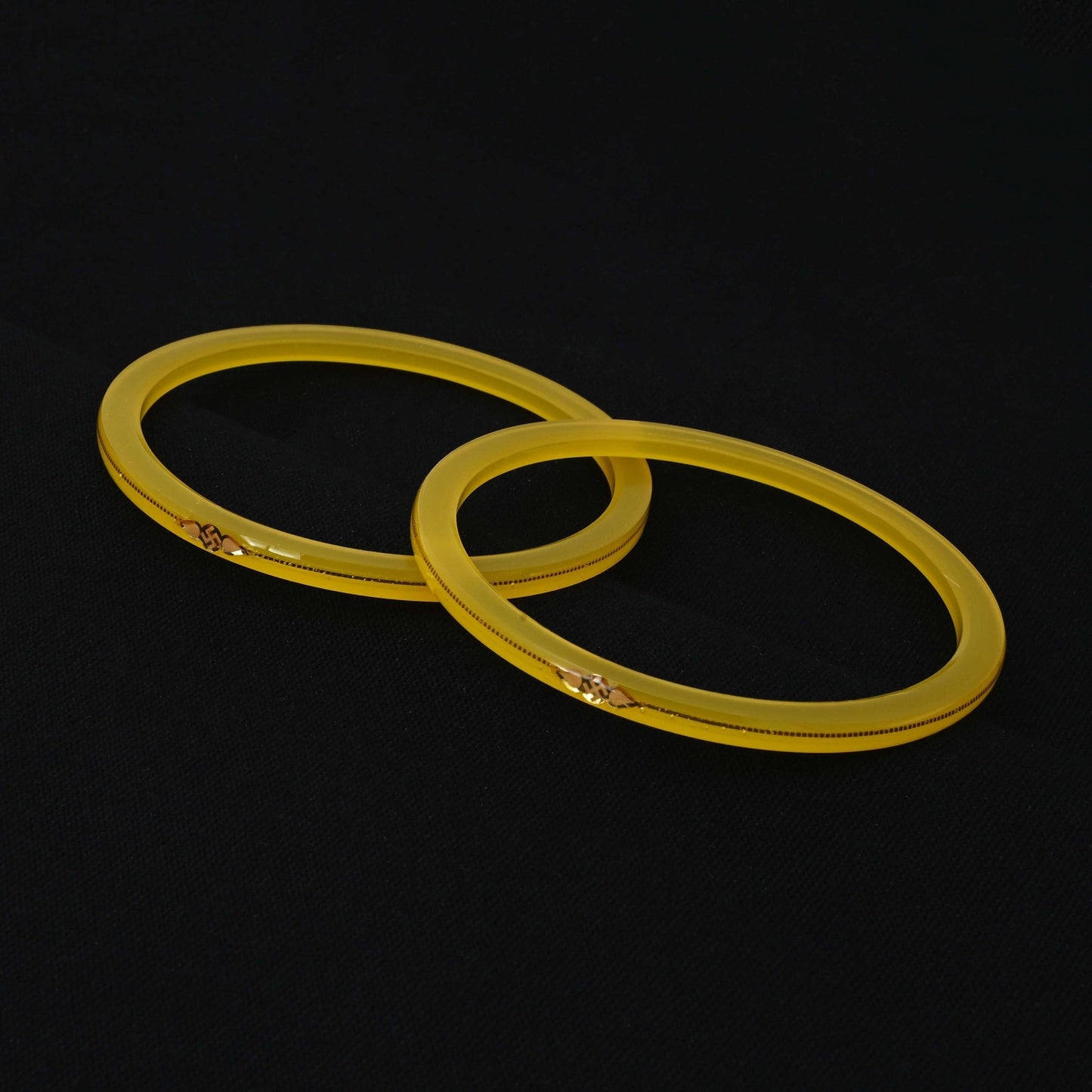 Gold Small Swastika Design Yellow Bangle.