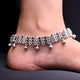 Silver antique elegance bridal anklets adorned with colorful beads.