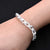 Elegant silver bracelet with a distinctive double cut pattern, designed for boys.