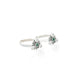 Stylish silver toe rings with bright, gleaming green details.