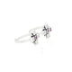 Charming silver toe rings adorned with lovely pink gemstones.