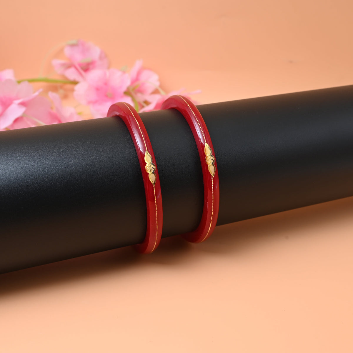 Gold red small swastika design bangle