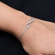 Elegant silver bracelet with an infinity symbol centerpiece for girls.