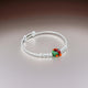 Charming silver kada featuring red and green teddy bears for boys.