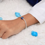 Load image into Gallery viewer, Elegant silver bracelet with evil eye charm for daily wear and protection
