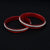 Charming red bangles with finely detailed silver engraving.