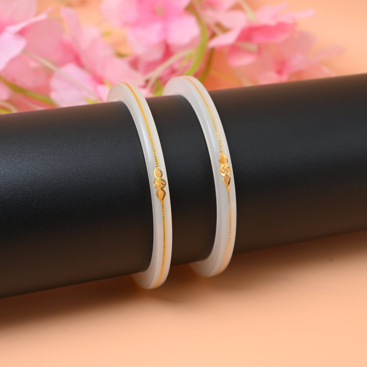 Gold small swastika design dark white bangle