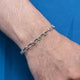 Elegant 925 sterling silver bracelet featuring a rope link chain pattern.