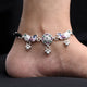 Peacock design silver anklet with pink gemstone.