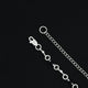 Stylish silver chain with black beads, tailored for boys.