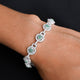 Silver bracelet with a premium 'Green Spark' design, tailored for her.