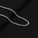 Elegant silver chain featuring shiny beads, perfect for girls.