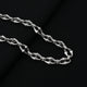 Shiny silver chain featuring radiant linked pattern, designed for boys.