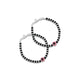 Silver bracelet featuring a red evil eye charm with black and silver beads.