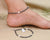 Sterling silver anklet with black beads for girls.