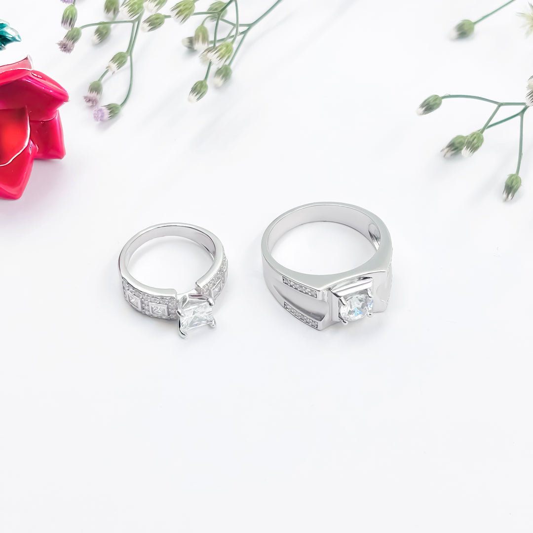 Unique Silver Couple Rings, Centered with a Radiant White Stone.