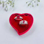 Load image into Gallery viewer, Stylish Silver Couple Rings with Radiant Pink Stone in the Middle.
