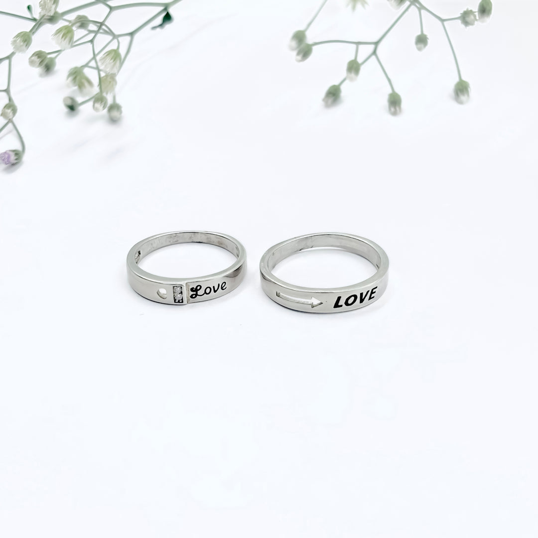 Unique Silver Couple Rings with Romantic "Love" Text at the Core.