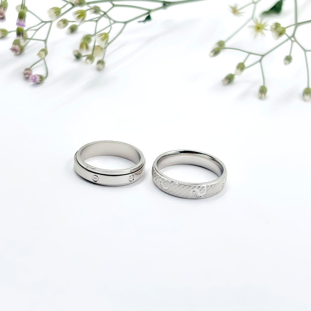Sleek Silver Couple Rings with a Beautiful and Simple Center Design.