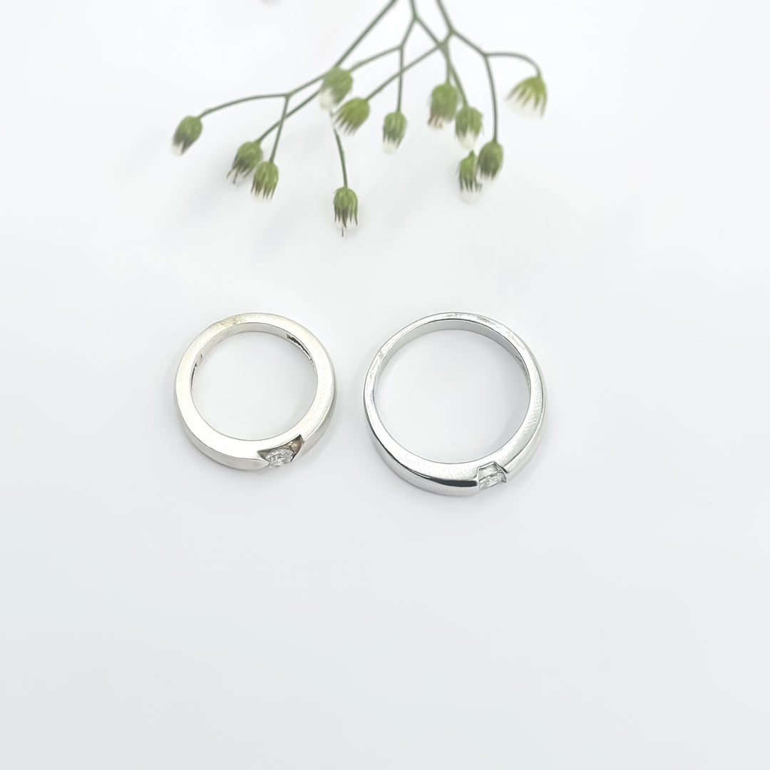 Beautiful Silver Couple Rings with Tiny White Stone in the Center.