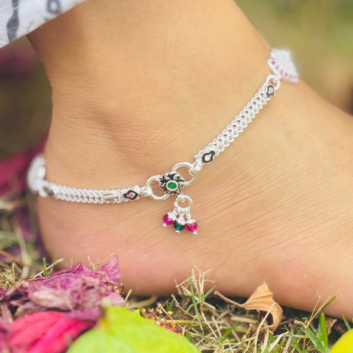 Stylish Silver Anklet with Heart Design Engraving at the Center.