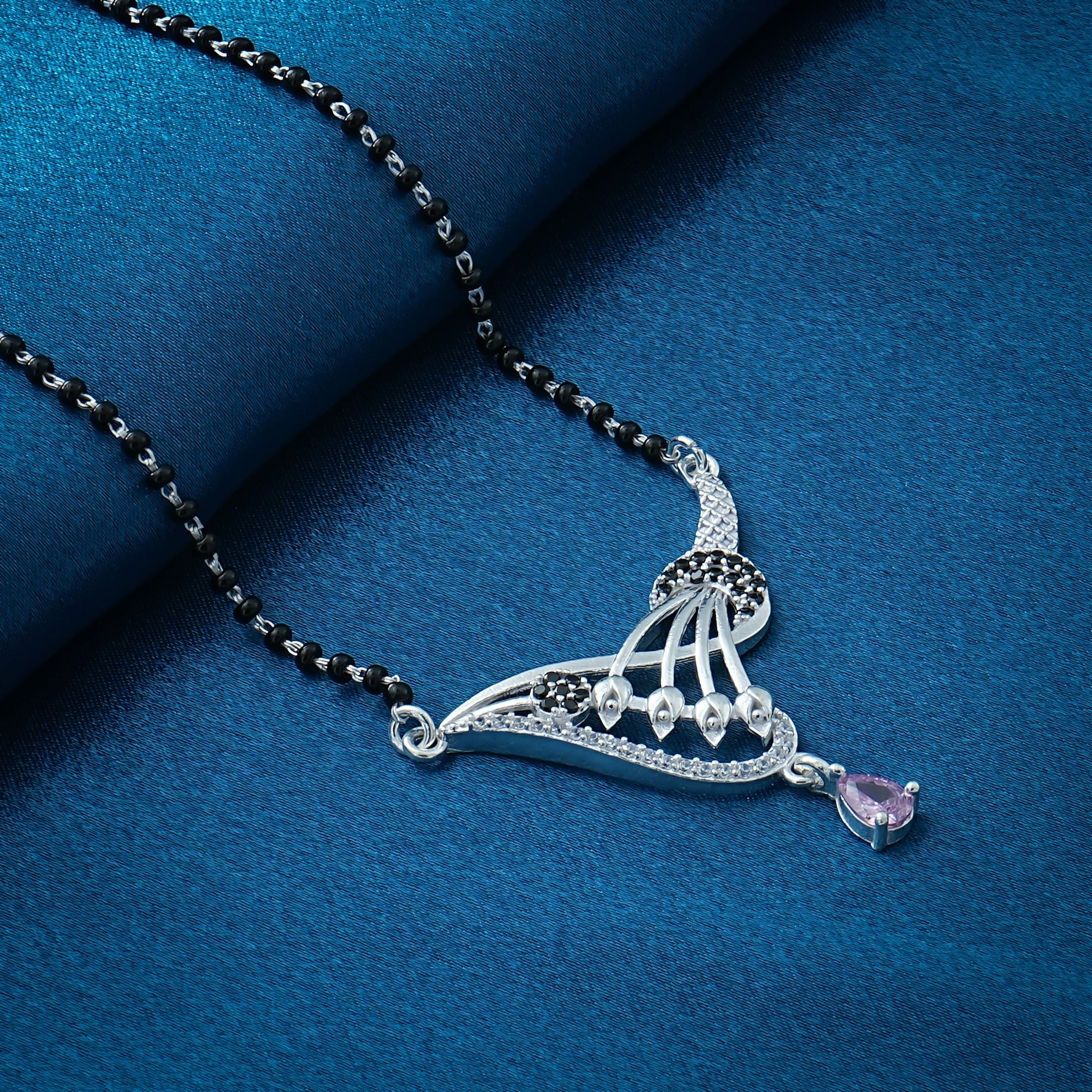 "Beautiful sterling silver mangalsutra adorned with a purple teardrop stone