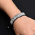 Silver bracelet featuring multiple cylinder-shaped silver beads, designed for boys.