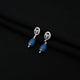 Stylish silver earrings adorned with blue oval beads and flower motifs for girls.