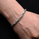 Elegant silver bracelet featuring a chain pattern with connecting links for boys.