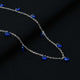 Boys' sterling silver chain with embedded blue gem stones.