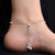 Exclusive silver anklets with pink and green beads for girls.