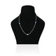 Elegant silver chain with blue evil eye beads for charm.