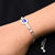 Stylish sterling silver bracelet showcasing a single evil eye charm and 'Love' writing for girls.