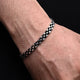 Trendy boys' bracelet featuring silver square joins design.