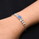 Stylish sterling silver bracelet with one evil eye charm for girls.