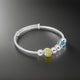 Elegant sterling silver kada with blue and yellow beads for boys.