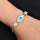 Silver bracelet with a trendy evil eye charm, designed for girls.